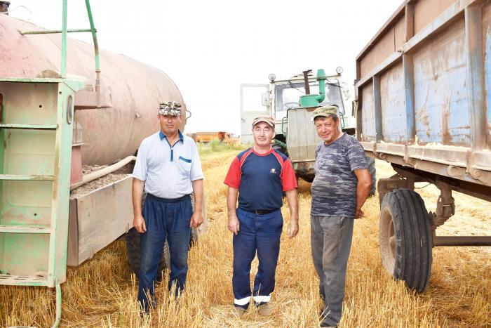 Механизаторы А.И. Янков, Н.И. Кузенков, М.М. Страхов